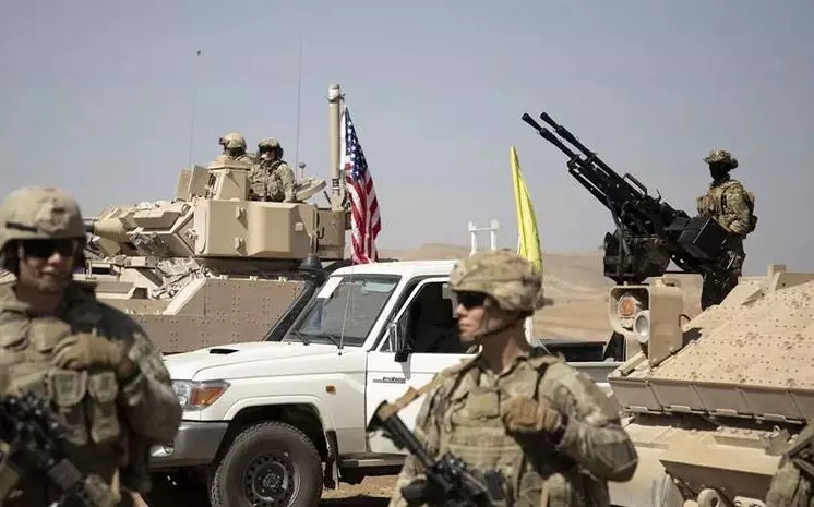 US captures IS official in Syria as fighting renews among allies