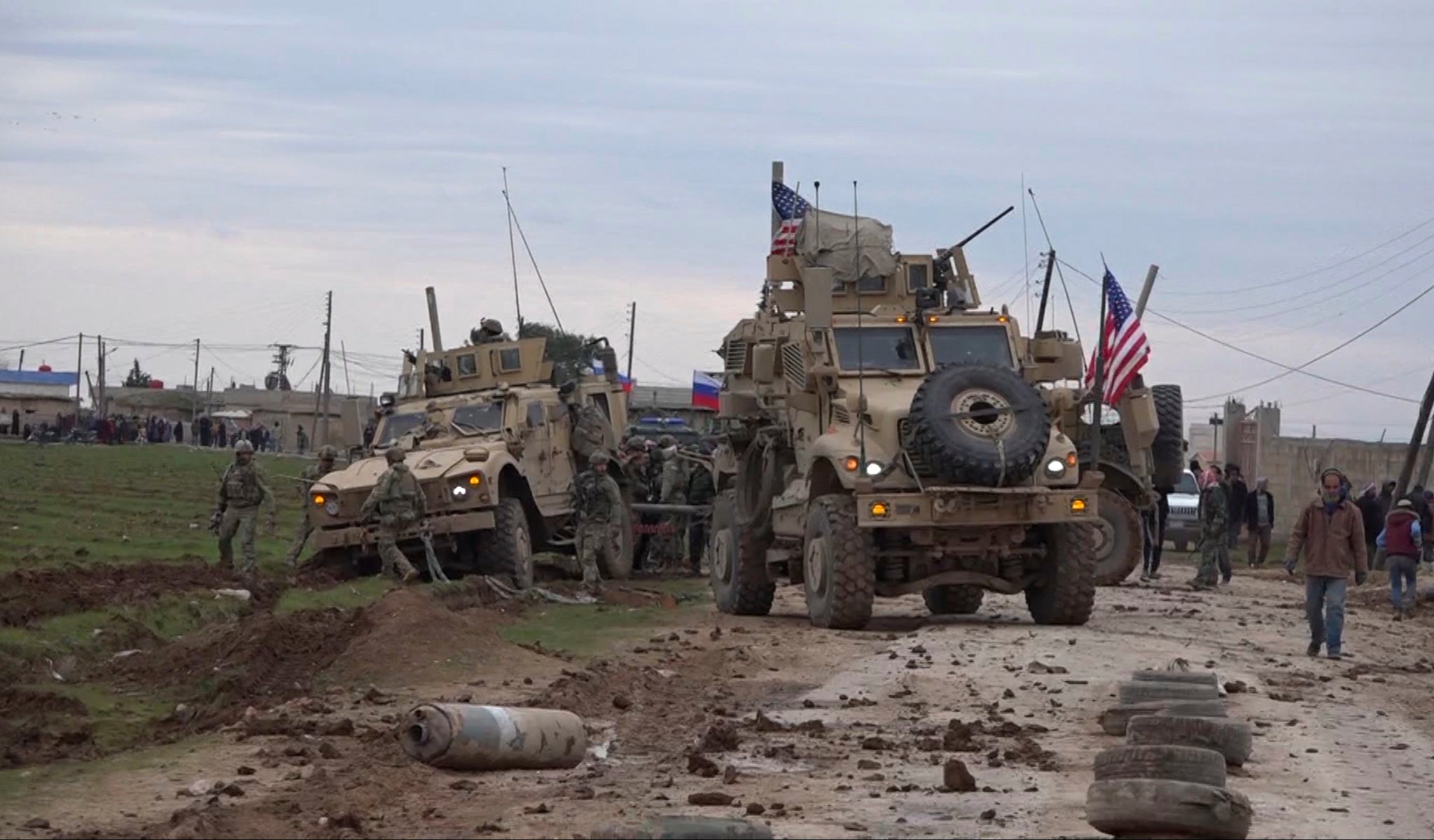Russian forces stop and turn back U.S. military convoy in Syria