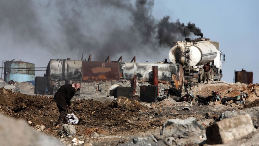 Oil smuggling in Syria worsens pollution in Euphrates River / Mohammed Hardan