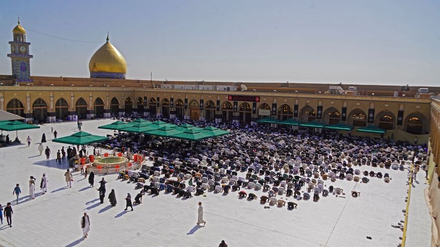 Iraq's Sadr indicates return to politics in public prayer session