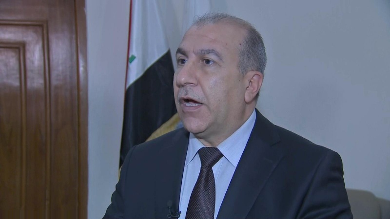 Spokesman says Iraqi government is officially caretaker Spokesman says Iraqi government is officially caretaker