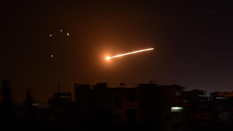 Syria air defenses down Israeli missiles over Homs: state media